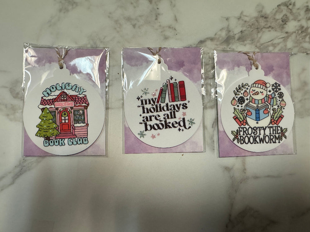 Three Ornaments with Book Themed Sayings and Illustrations