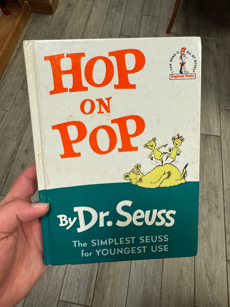 Dr. Seuss Hop on Pop hardcover children's book with orange title and teal band