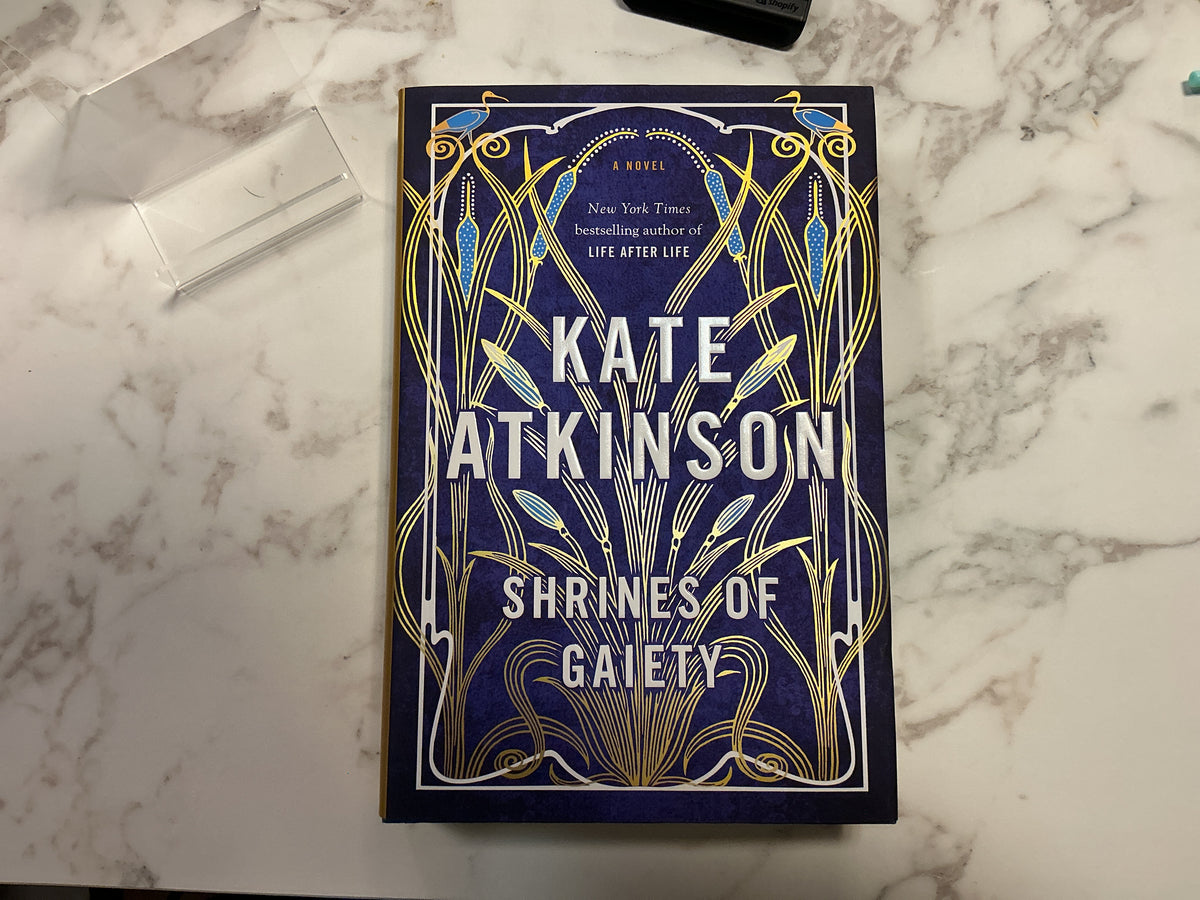 Shrines of Gaiety hardcover book by Kate Atkinson with navy blue Art Nouveau cover