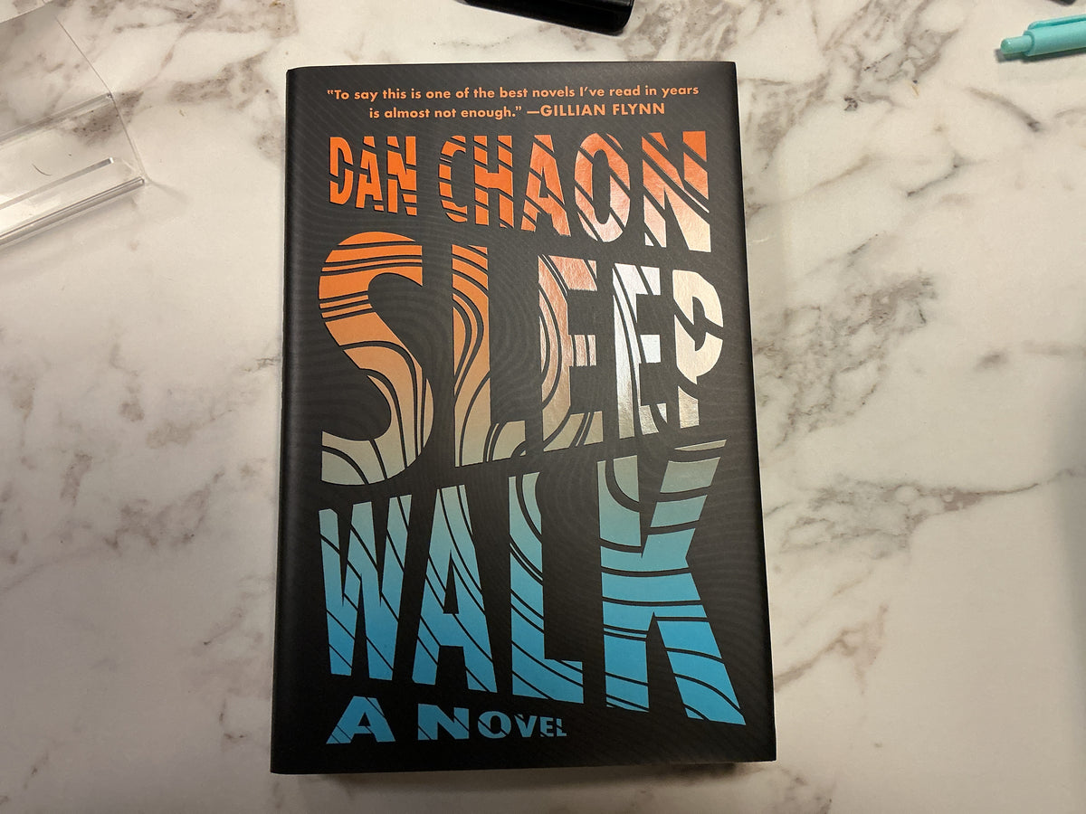 Sleep Walk hardcover novel by Dan Chaon with orange-to-blue gradient cover design