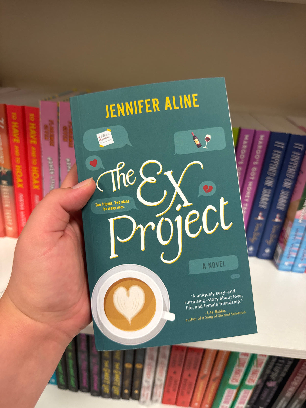 The Ex Project paperback by Jennifer Aline with teal cover and gold title