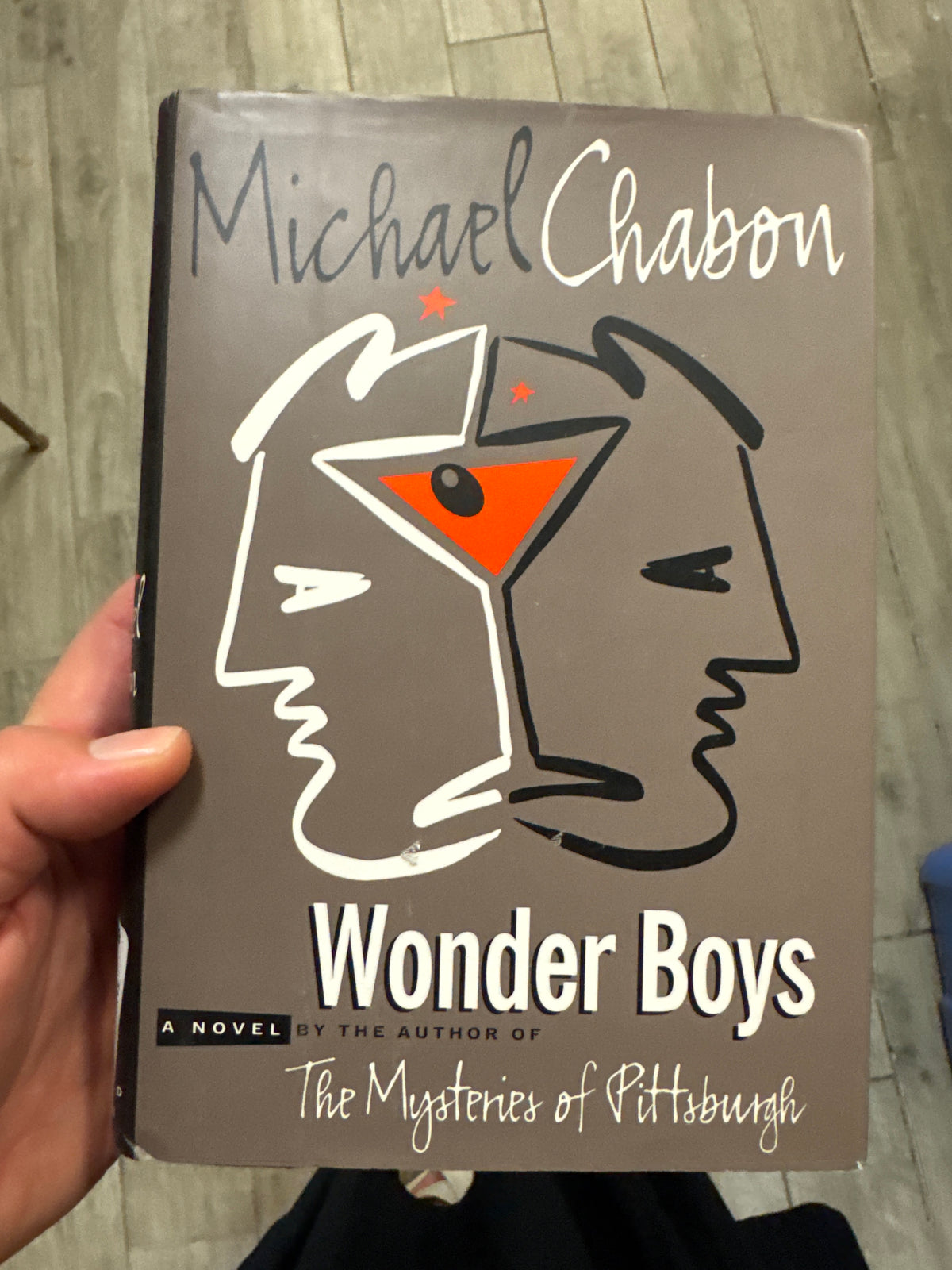 Wonder Boys hardcover novel by Michael Chabon with taupe cover and stylized line art