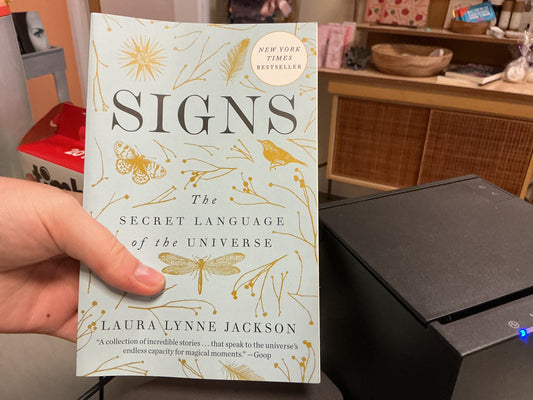 Signs: The Secret Language of the Universe