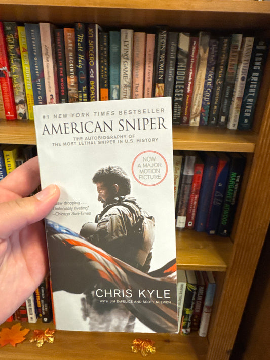 American Sniper paperback by Chris Kyle, New York Times Bestseller cover with military flag design