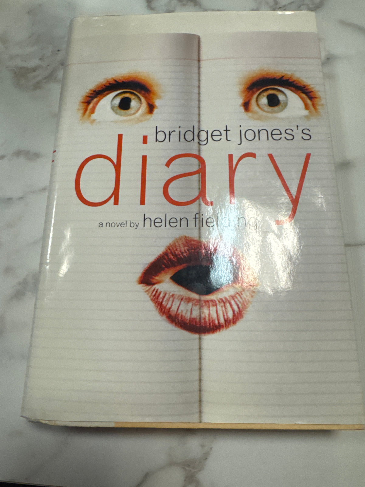 Bridget Jones's Diary hardcover novel with notebook paper cover design and red lips