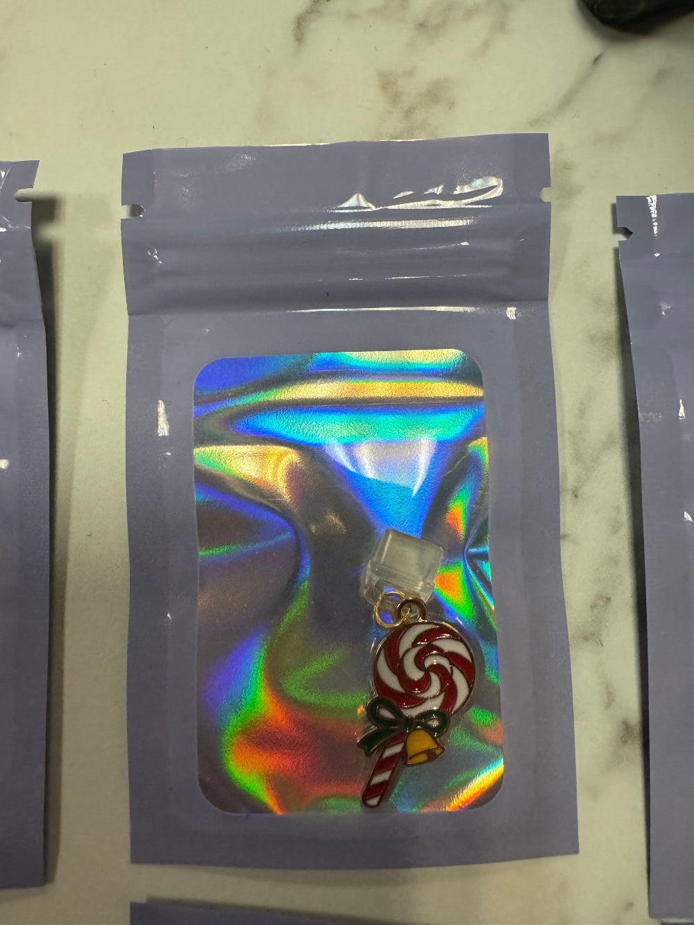 Holographic Packaging with Candy Cane Kindle Charm inside