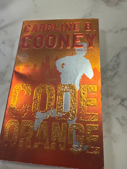 Code Orange paperback thriller novel by Caroline B. Cooney with metallic orange cover and gold lettering