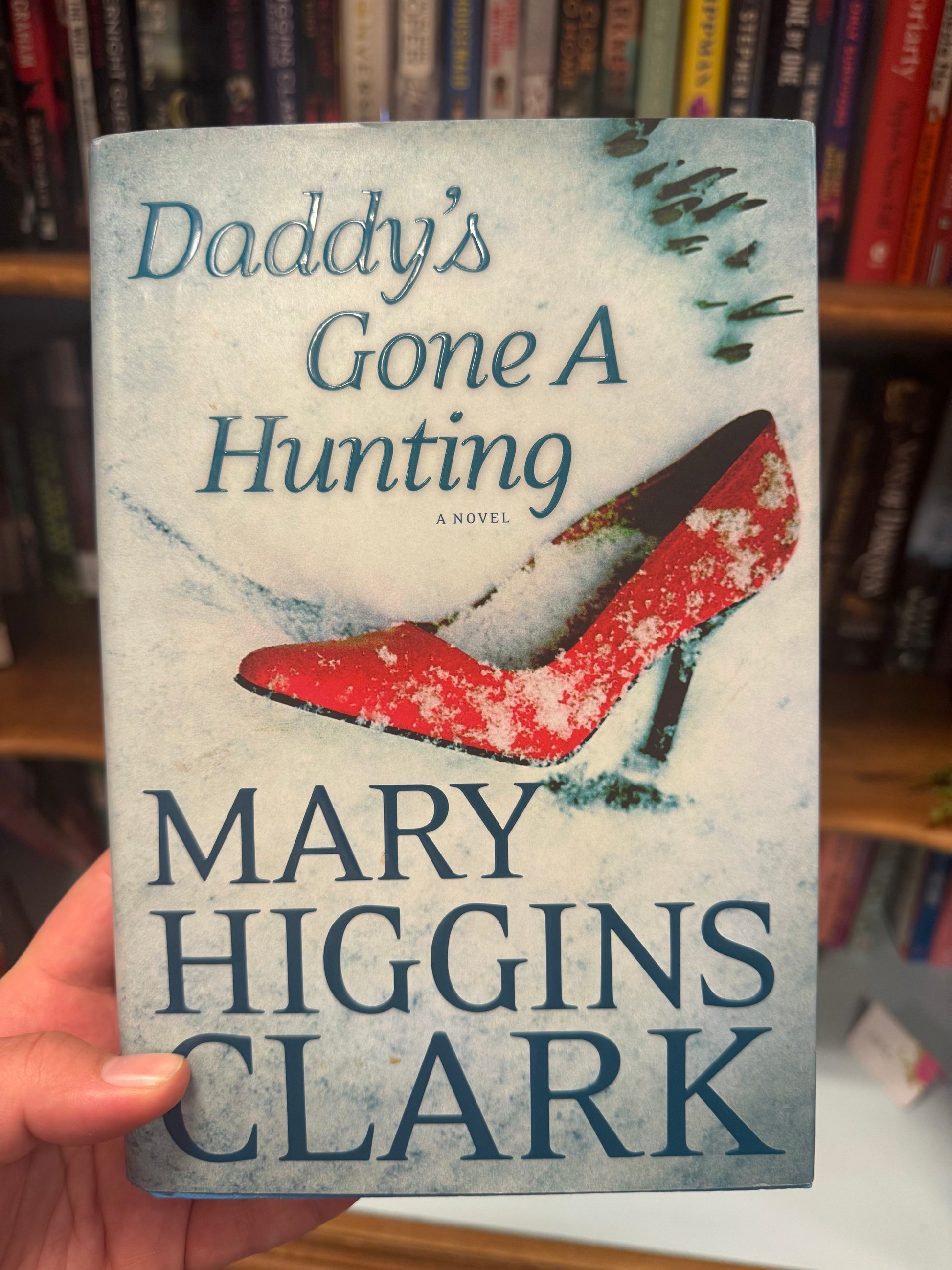 Daddy's Gone A Hunting hardcover novel by Mary Higgins Clark with red shoe cover art