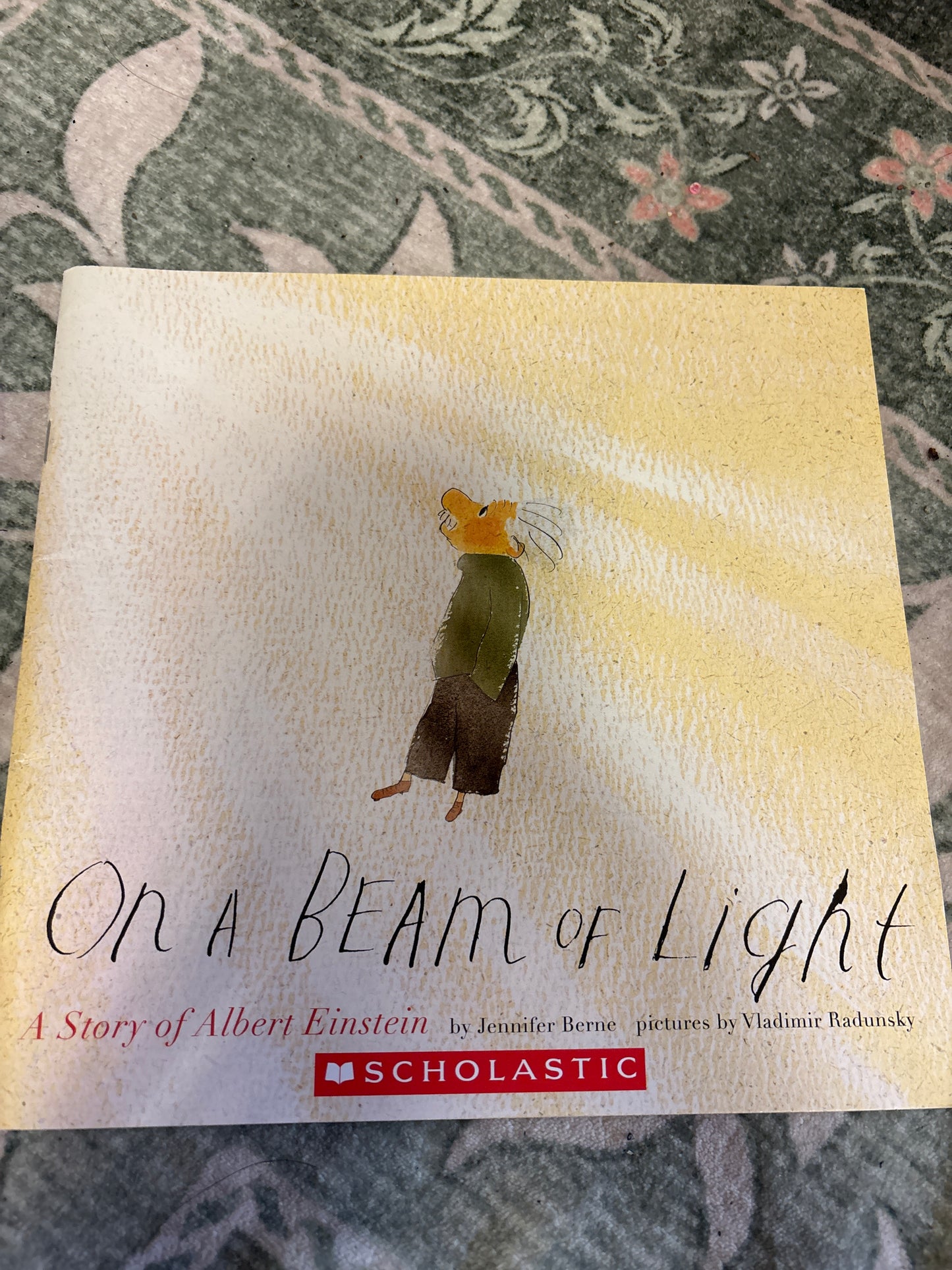 On a Beam of Light