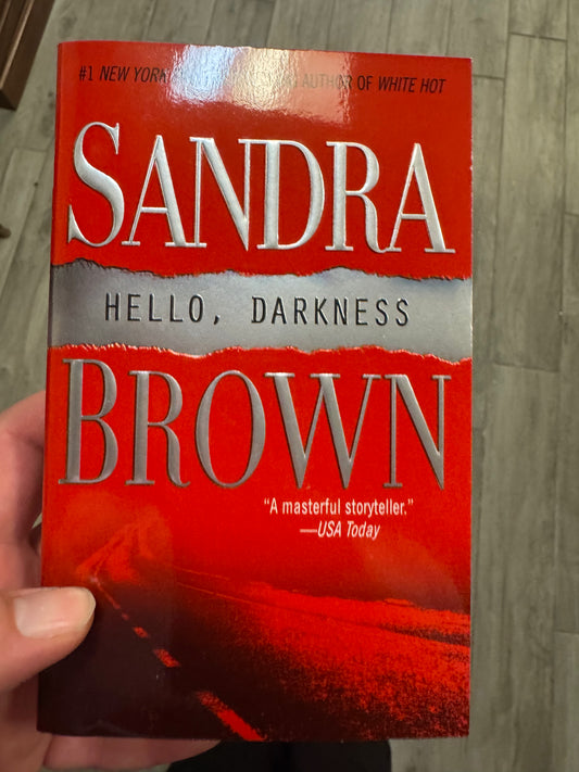 Hello Darkness paperback by Sandra Brown, red cover with silver embossed title and author name
