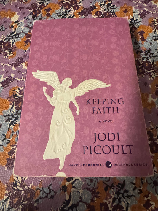 Keeping Faith paperback by Jodi Picoult with white embossed angel cover design