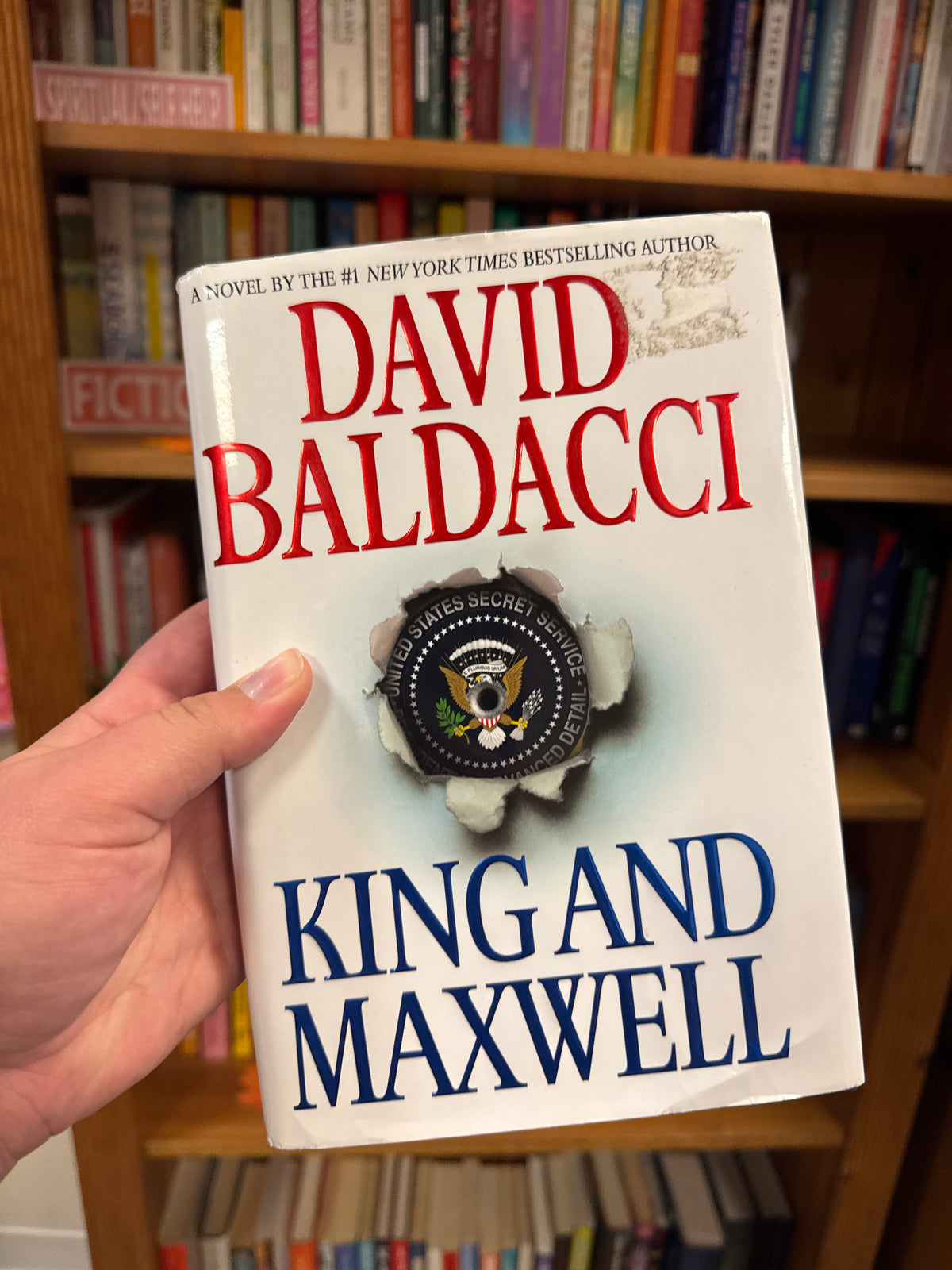 King and Maxwell hardcover novel by David Baldacci with Secret Service badge cover art