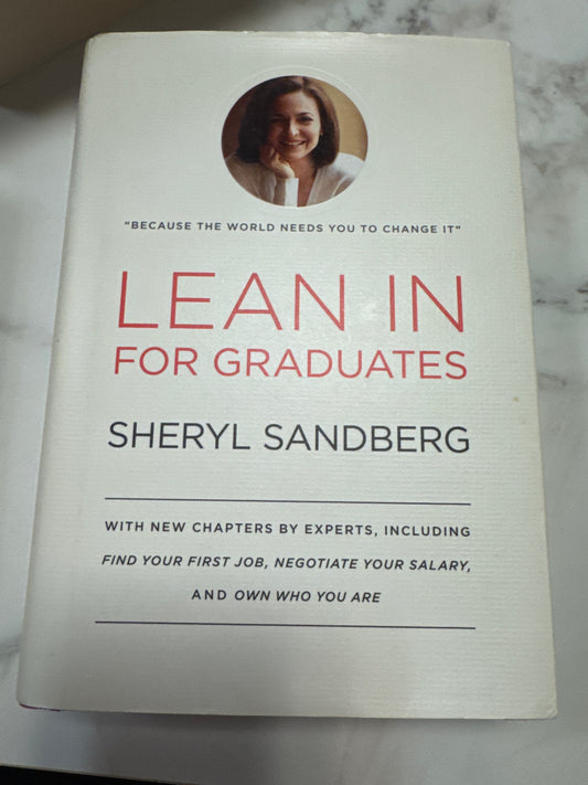 Lean in for graduates hardcover book by Sheryl Sandberg with red title text on white cover