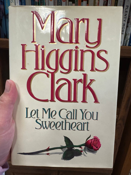 Let Me Call You Sweetheart hardcover book by Mary Higgins Clark with pink rose cover design