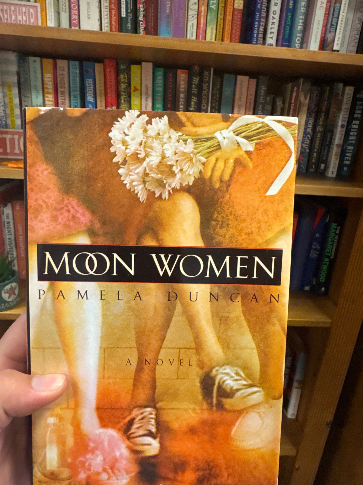 Moon Women paperback book by Pamela Duncan with floral cover art