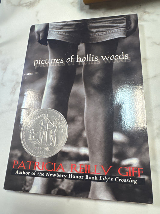 Pictures of Hollis Woods paperback book by Patricia Reilly Giff with Newbery Honor medal sticker
