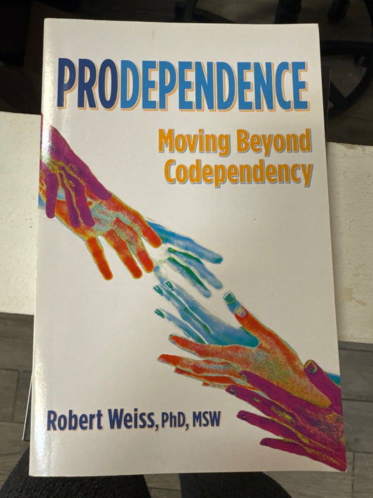 Prodependence softcover book by Robert Weiss PhD moving beyond codependency with colorful hands illustration