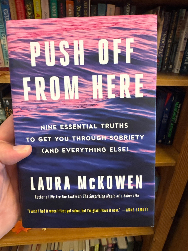 Hardcover book Push Off From Here by Laura McKowen with pink and blue water ripple cover