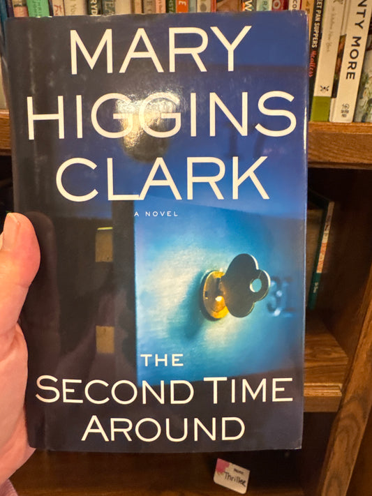 The Second Time Around hardcover novel by Mary Higgins Clark with blue cover and key illustration