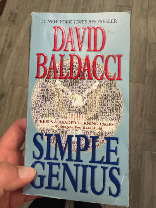 Simple Genius paperback by David Baldacci, #1 New York Times Bestseller thriller novel