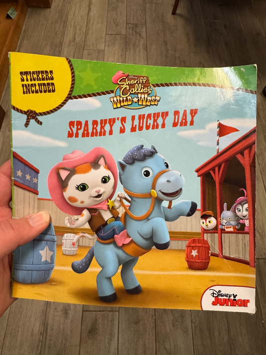 Book cover of 'Sparky's Lucky Day' from Disney Junior featuring a cartoon cat and horse.