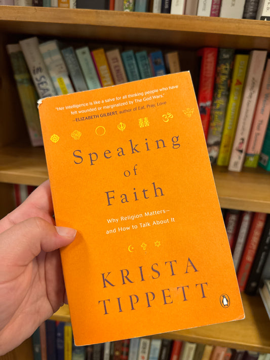 Speaking of Faith hardcover book by Krista Tippett with orange matte cover and religious symbols