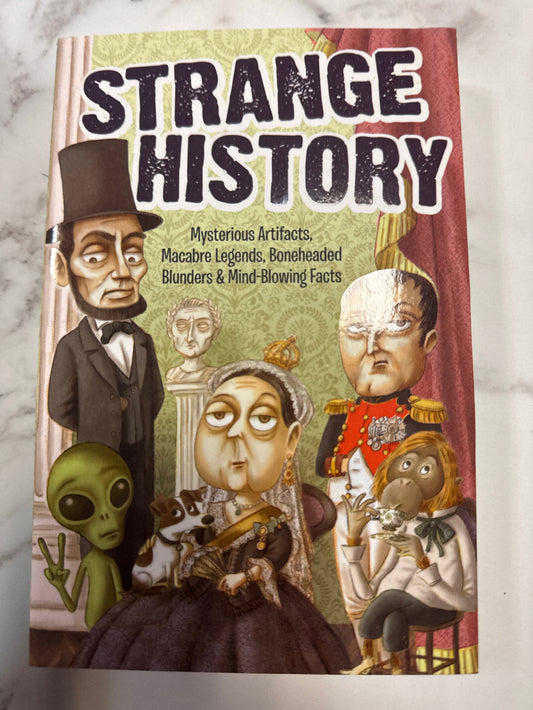 Book cover of 'Strange History' with illustrated faces and text on a marble surface