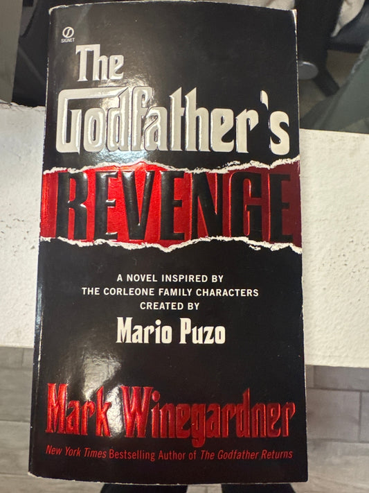 The Godfather's Revenge paperback novel by Mark Winegardner, featuring bold red title text and Corleone family-inspired design