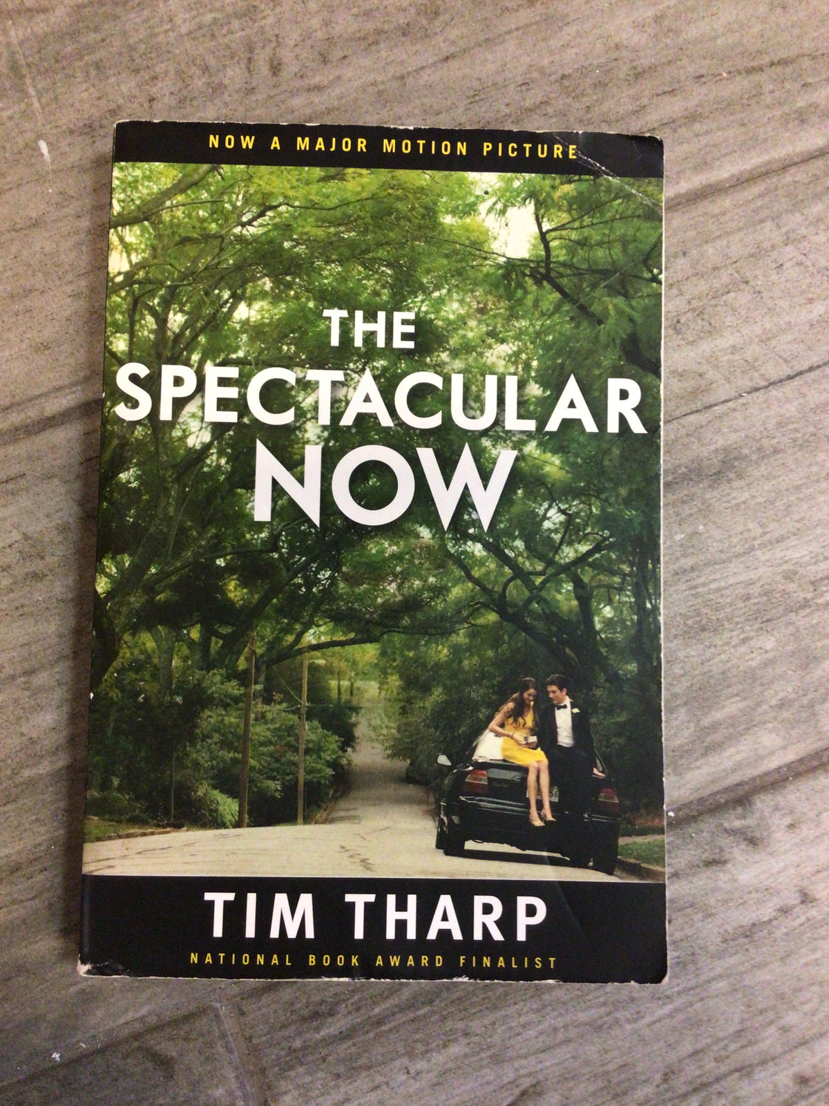 The Spectacular Now paperback book by Tim Tharp with movie tie-in cover art