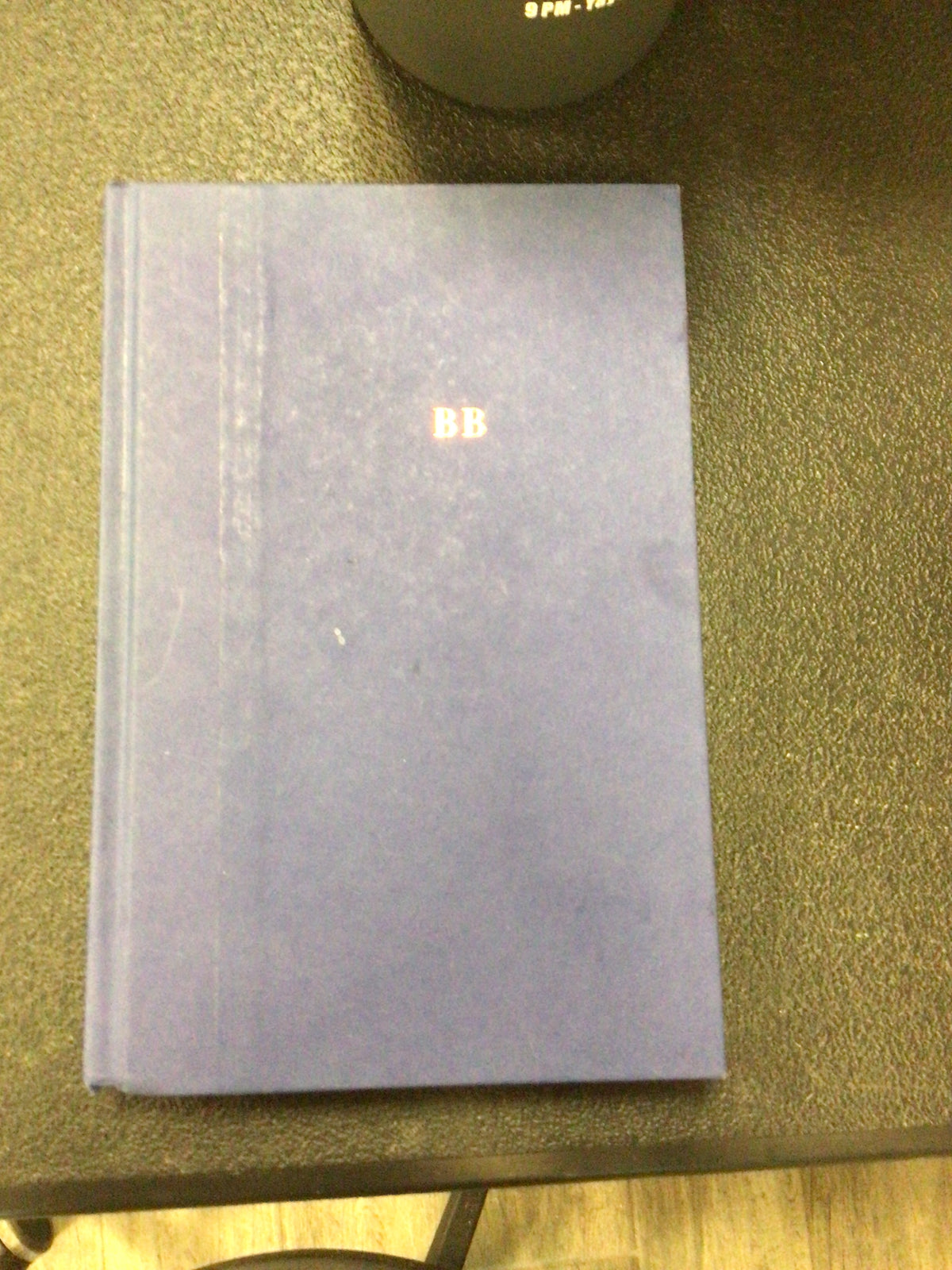 The Vanishing Half hardcover book by Brit Bennett with gold foil initials