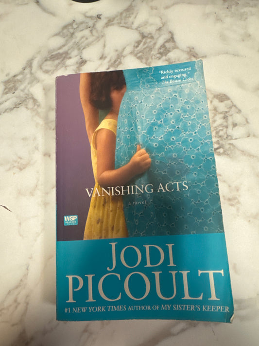 Vanishing Acts paperback novel by Jodi Picoult on marble surface