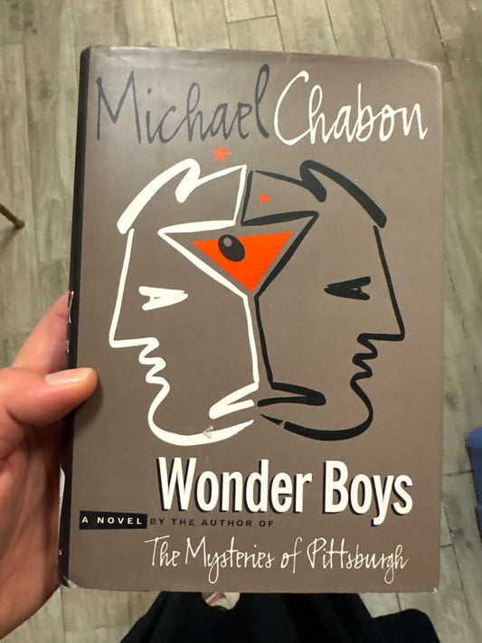 Wonder Boys hardcover novel by Michael Chabon with taupe cover and stylized line art